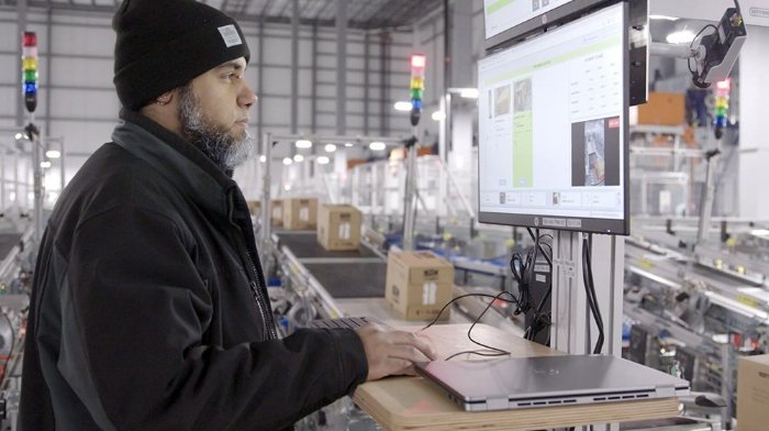 Man operating machine at walmart distribution center